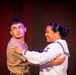 U.S. maritime service members participate in a salsa competition in Miami’s historic Tower Theater