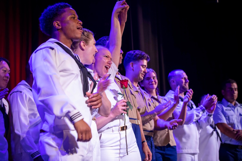 U.S. maritime service members participate in a salsa competition in Miami’s historic Tower Theater