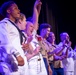 U.S. maritime service members participate in a salsa competition in Miami’s historic Tower Theater