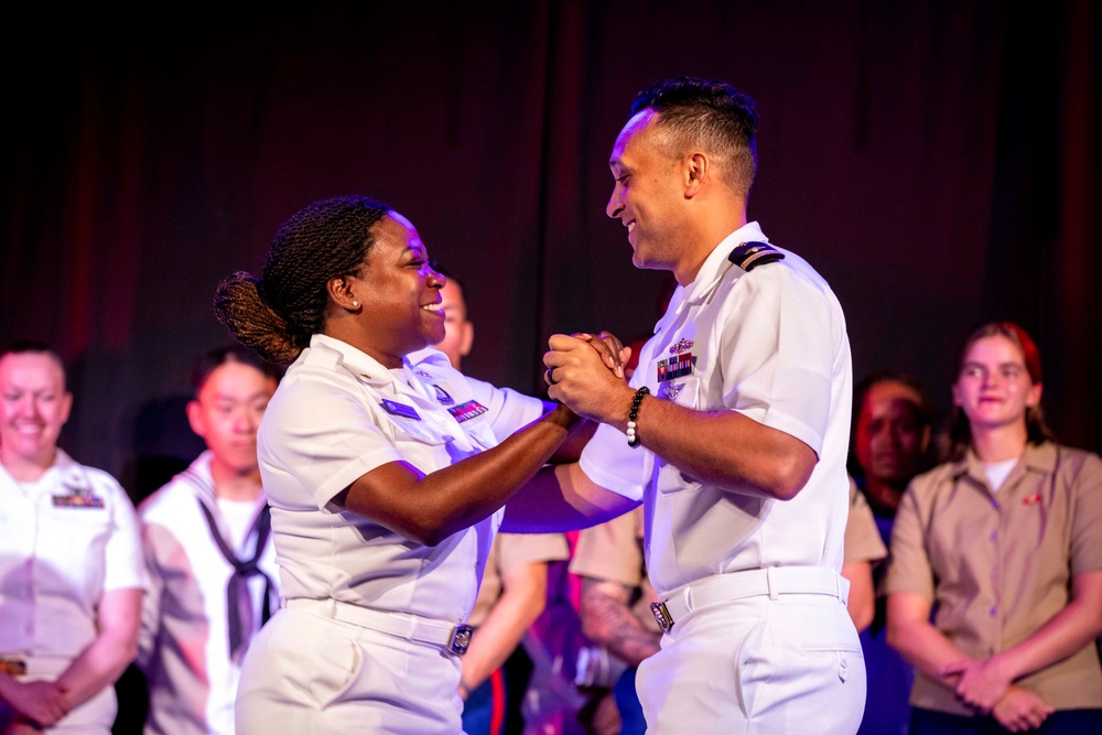 U.S. maritime service members participate in a salsa competition in Miami’s historic Tower Theater