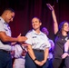 U.S. maritime service members participate in a salsa competition in Miami’s historic Tower Theater