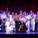 U.S. maritime service members participate in a salsa competition in Miami’s historic Tower Theater