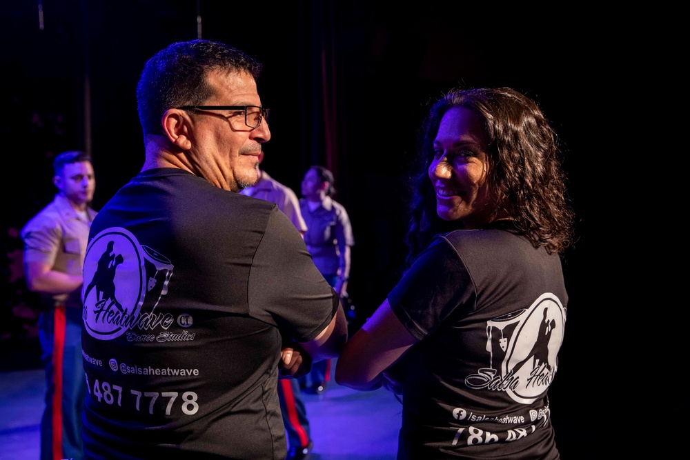 U.S. maritime service members participate in a salsa competition in Miami’s historic Tower Theater