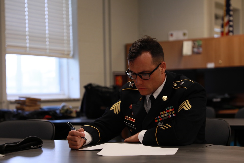 Virginia Army National Guardsman completes Written Test in Appearance Board during Region II Best Warrior Competition