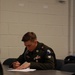 Virginia Army National Guardsman Completes Written Test during Region 2 Best Warrior Competition