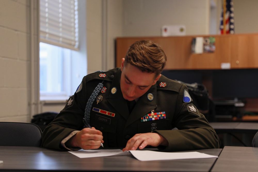 Virginia Army National Guardsman Completes Written Test during Region 2 Best Warrior Competition