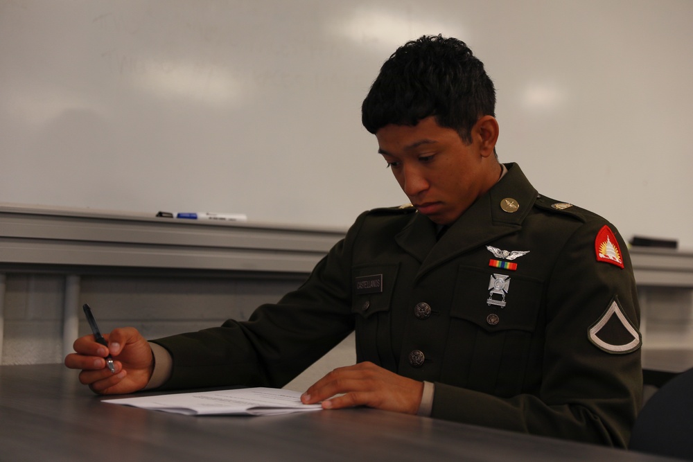 DC Army National Guardsman Completes Written Test during Region 2 Best Warrior Competition
