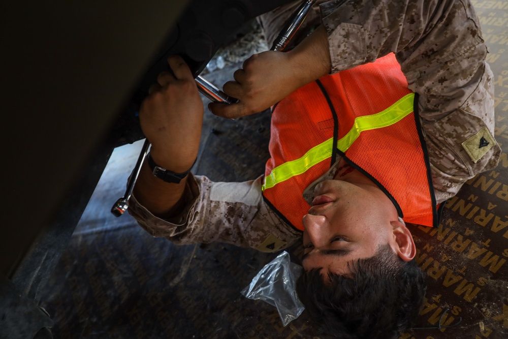 U.S. Marines Conduct Maintenance on Tactical Vehicles in Preparation for NF 24