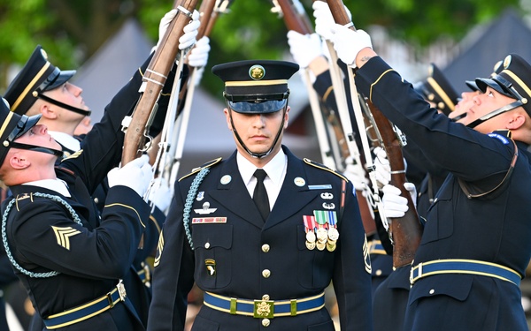The Deputy Under Secretary of the Army is hosting the Twilight Tattoo