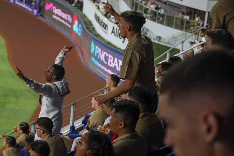 Marines and Sailors attend a Marlins baseball game during Fleet Week Miami