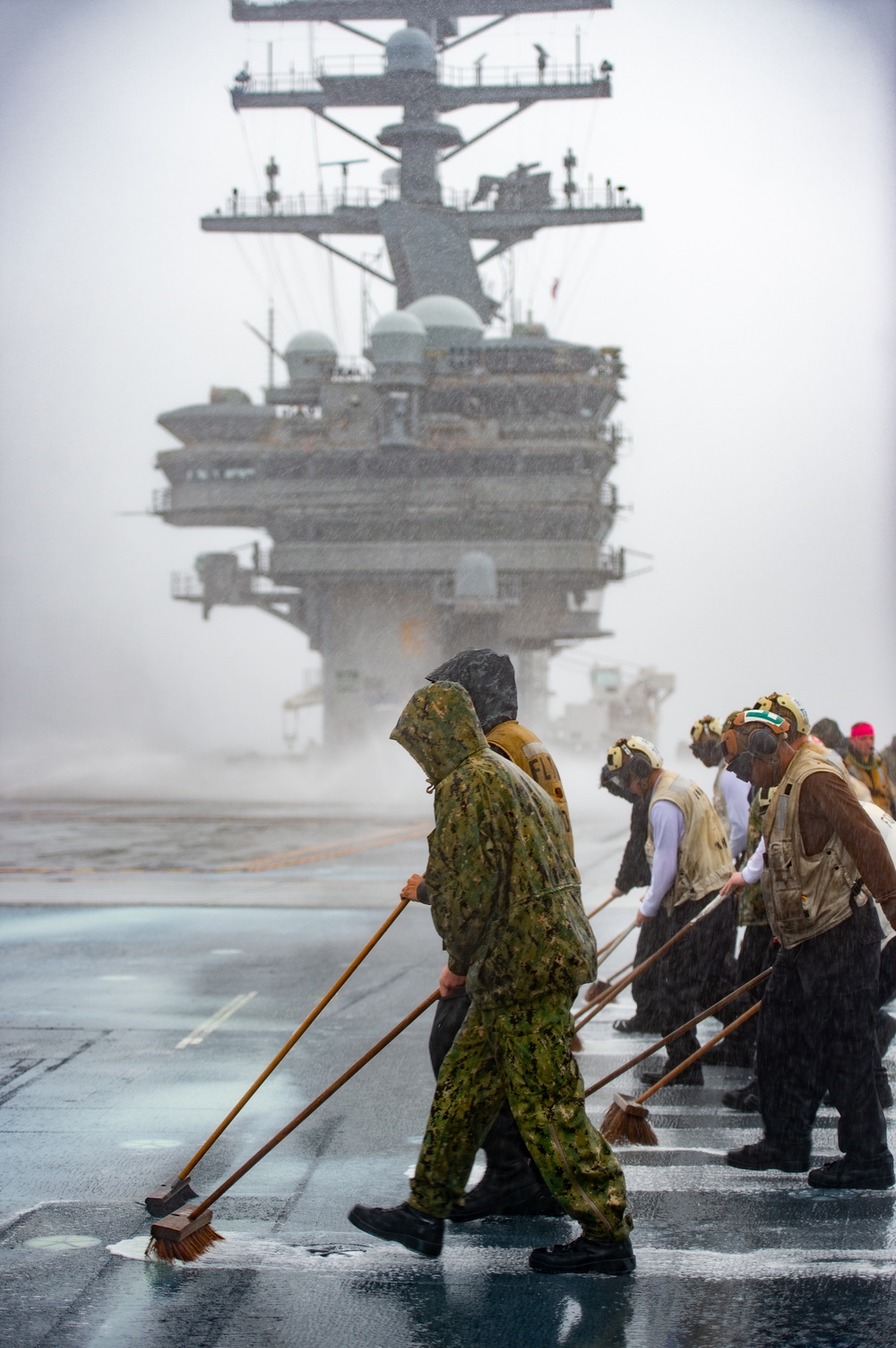 USS Ronald Reagan (CVN 76) Sailors test flight deck countermeasure washdown system