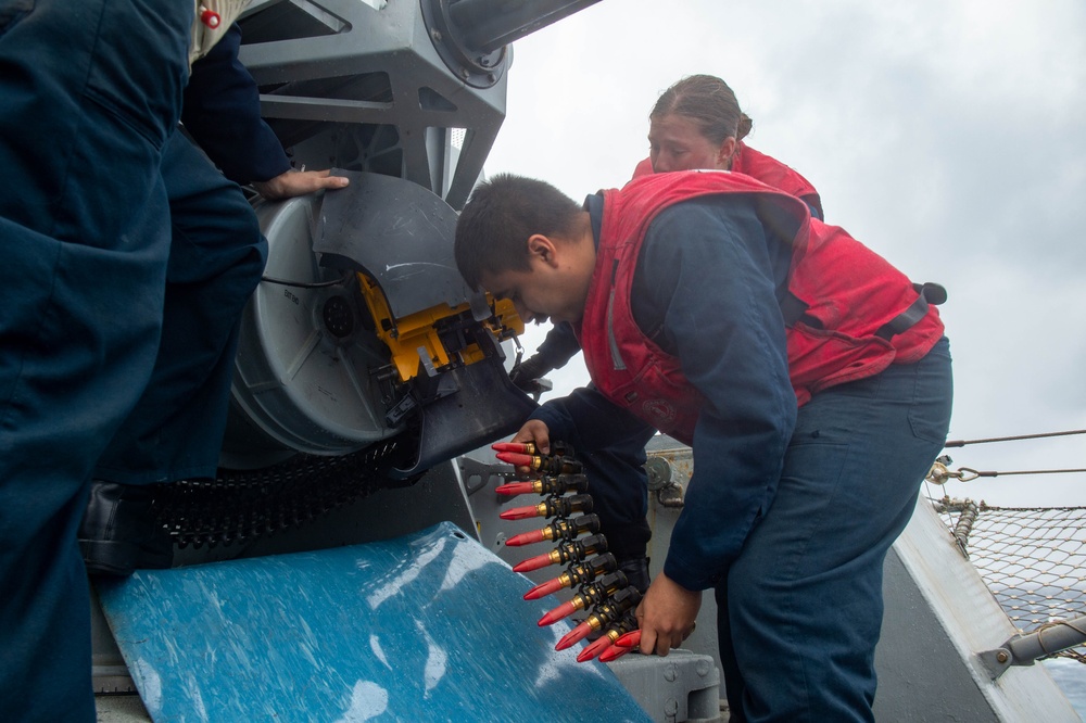USS Ronald Reagan (CVN 76) Sailors upload ammunition to Close-In Weapon System