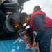 USS Ronald Reagan (CVN 76) Sailors upload ammunition to Close-In Weapon System