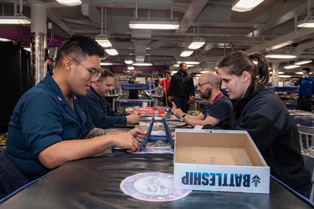 USS Ronald Reagan (CVN 76) Sailors play board games during Morale, Welfare, and Recreation event