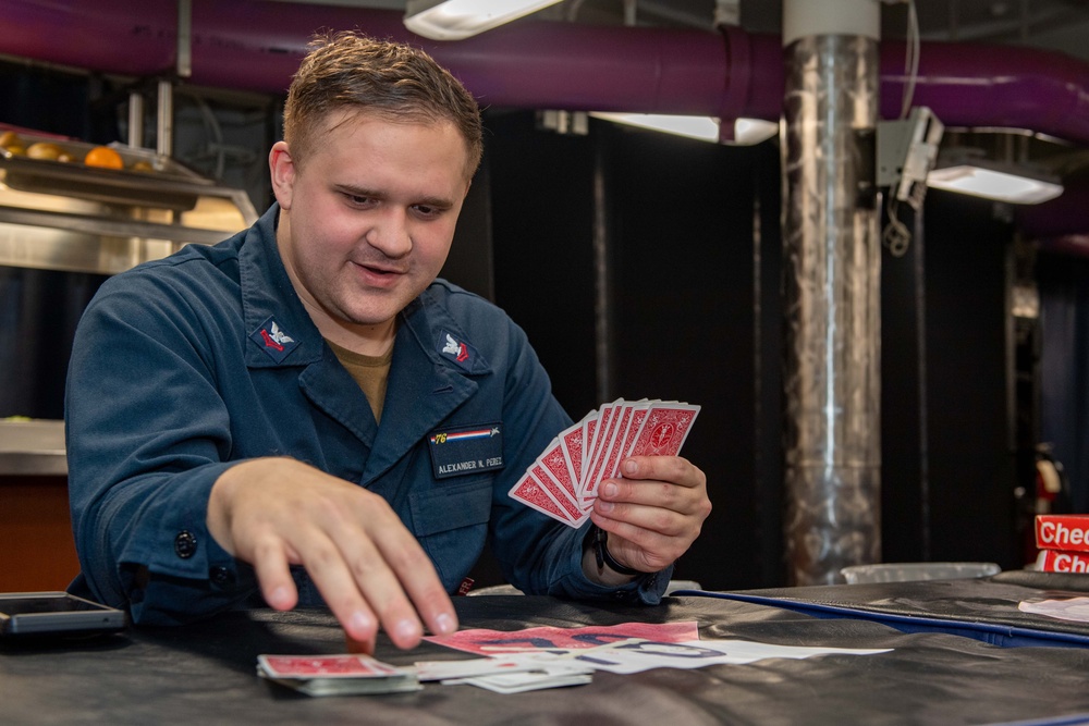 USS Ronald Reagan (CVN 76) Sailors play board games during Morale, Welfare, and Recreation event