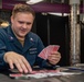 USS Ronald Reagan (CVN 76) Sailors play board games during Morale, Welfare, and Recreation event