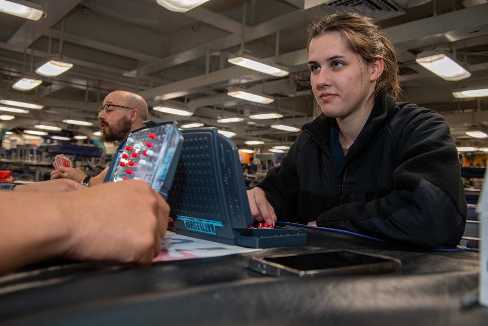 USS Ronald Reagan (CVN 76) Sailors play board games during Morale, Welfare, and Recreation event