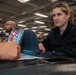 USS Ronald Reagan (CVN 76) Sailors play board games during Morale, Welfare, and Recreation event