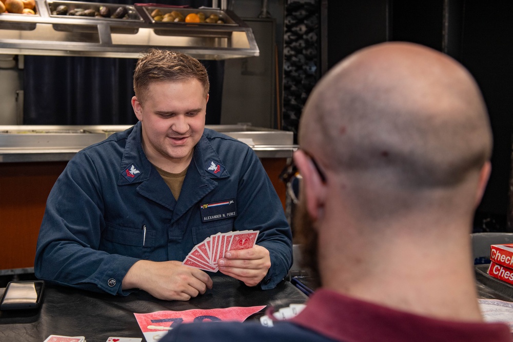 USS Ronald Reagan (CVN 76) Sailors play board games during Morale, Welfare, and Recreation event