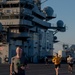 USS Ronald Reagan (CVN 76) Sailors participate in flight deck 5K run