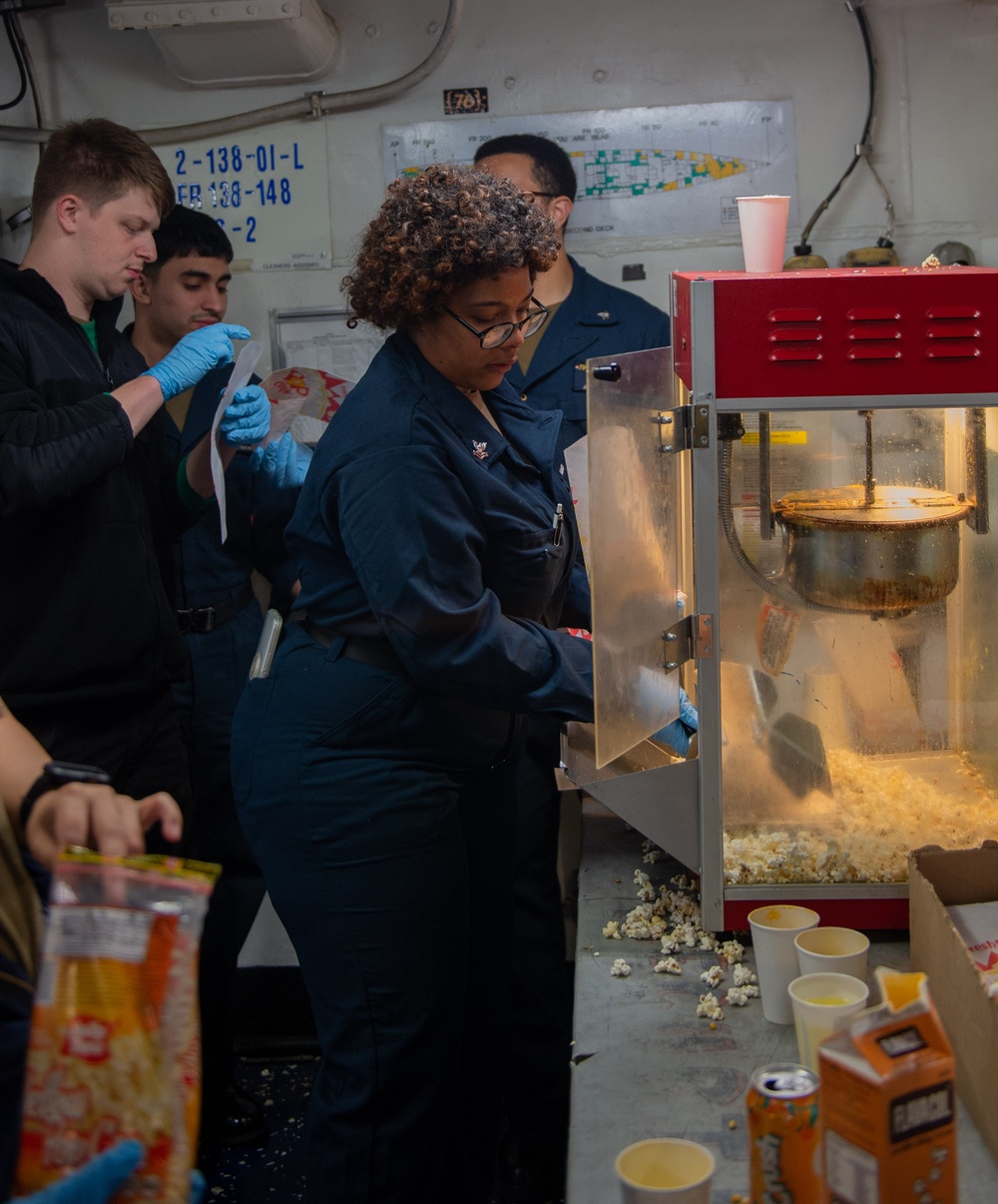 USS Ronald Reagan (CVN76) Sailors participate in an ice cream social