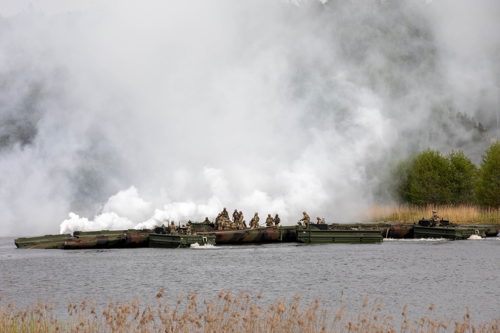 Soldiers moving equipment during Immediate Response 24