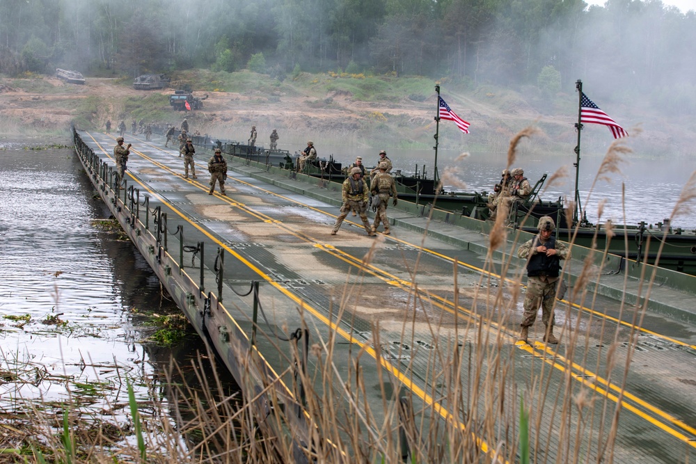 Soldiers moving equipment during Immediate Response 24