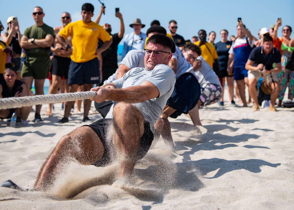 U.S. Coast Guard members compete in tug-of-war during the “Top Gun” Beach Olympics event in Miami Beach, Fla., during Fleet Week Miami, May 11, 2024.