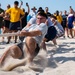 U.S. Coast Guard members compete in tug-of-war during the “Top Gun” Beach Olympics event in Miami Beach, Fla., during Fleet Week Miami, May 11, 2024.