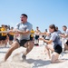 U.S. Coast Guard members compete in tug-of-war during the “Top Gun” Beach Olympics event in Miami Beach, Fla., during Fleet Week Miami, May 11, 2024.