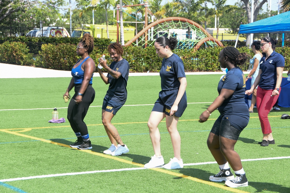U.S. Sailors and Marines attend a Healthy Kids event at the Hallandale Beach Family Center during Fleet Week Miami 2024