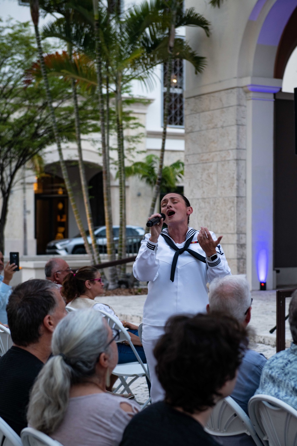 U.S. Navy Musician 3rd Class Bernadette Rocks, from Tannersville, N.J., assigned Navy Band Southeast, performs to a crowd during a public concert in Coral Gables, Fla., during Fleet Week Miami May 11, 2024.