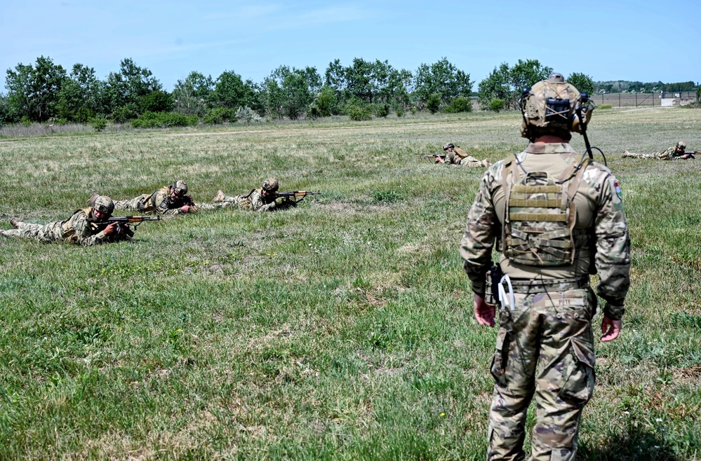 Air Advisor from the 435th CRE shares tactics with Hungarian troops