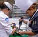 U.S. maritime servicemembers participate in a “Galley Wars” cooking competition at Miami-Dade College