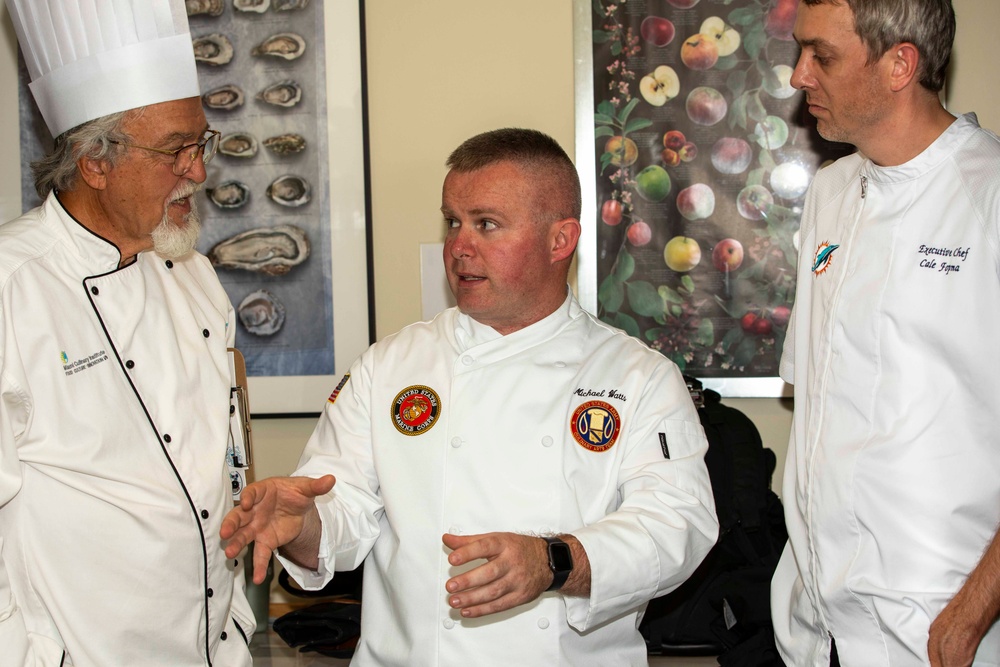 U.S. maritime servicemembers participate in a “Galley Wars” cooking competition at Miami-Dade College