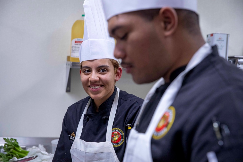 U.S. maritime servicemembers participate in a “Galley Wars” cooking competition at Miami-Dade College