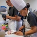 U.S. maritime servicemembers participate in a “Galley Wars” cooking competition at Miami-Dade College