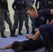 U.S. Coast Guard law enforcement instructors provides handcuffing techniques at TRADEWINDS 24