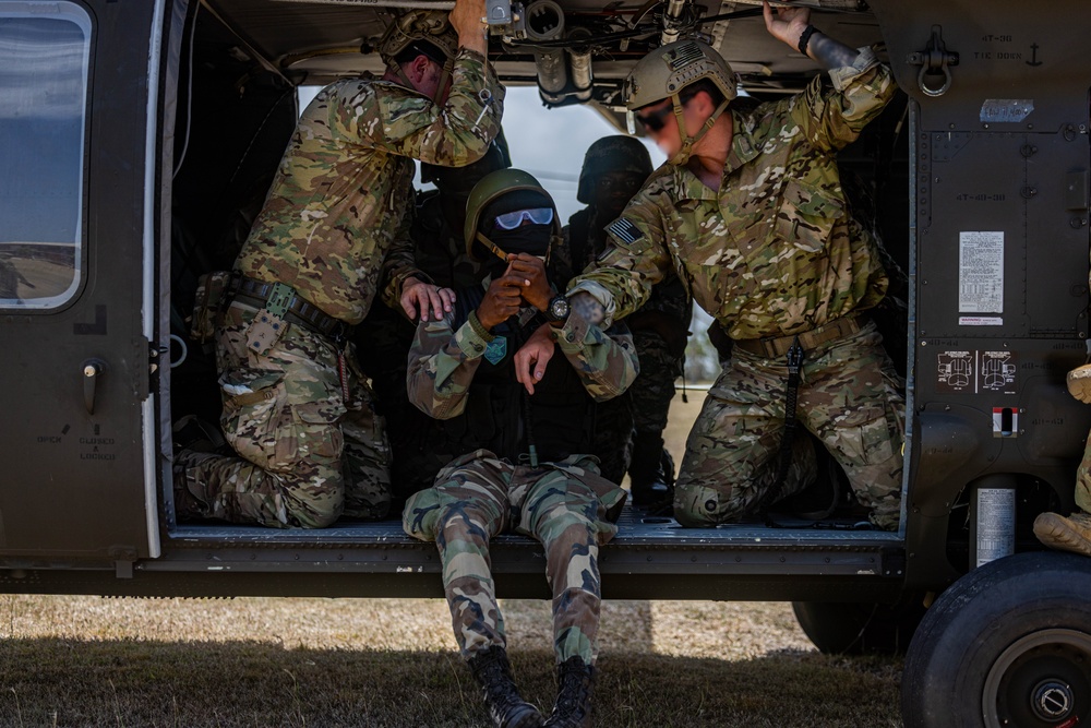 7th Special Operations Group (Airborne) Soldiers lead fast rope training for 8 partner nations