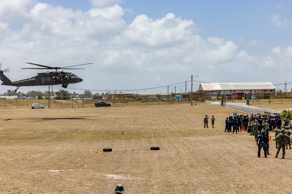 7th Special Operations Group (Airborne) Soldiers lead fast rope training for 8 partner nations