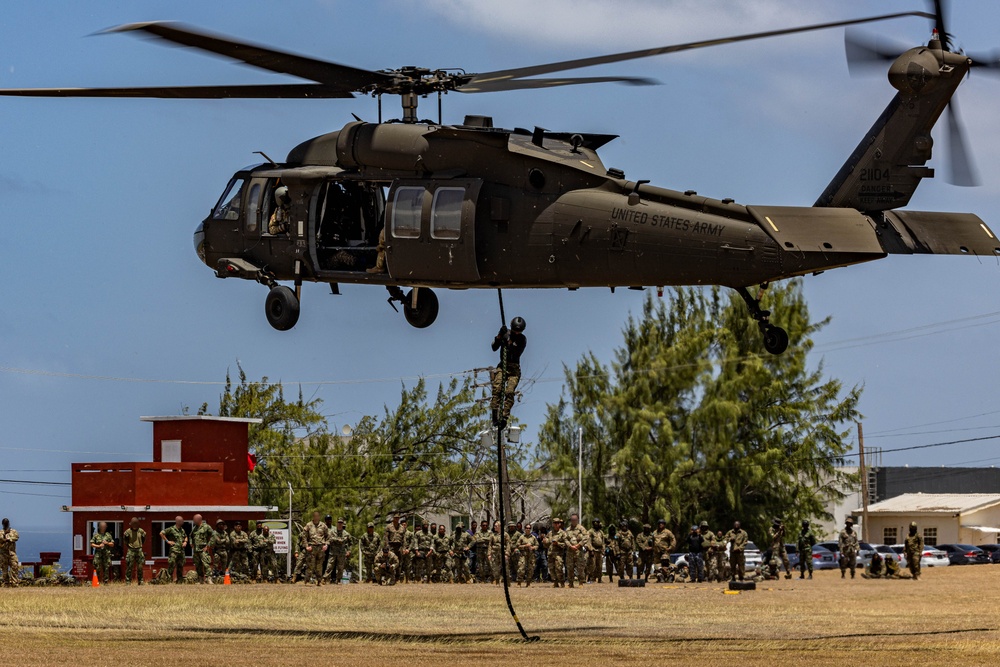 7th Special Operations Group (Airborne) Soldiers lead fast rope training for 8 partner nations