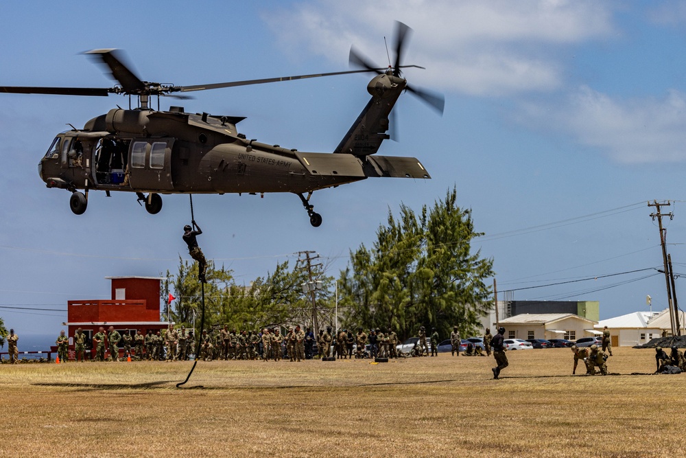 7th Special Operations Group (Airborne) Soldiers lead fast rope training for 8 partner nations