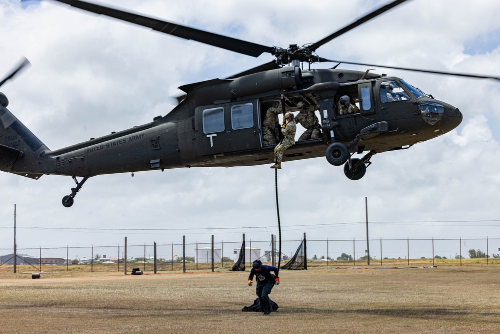 7th Special Operations Group (Airborne) Soldiers lead fast rope training for 8 partner nations