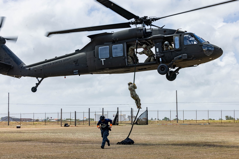 7th Special Operations Group (Airborne) Soldiers lead fast rope training for 8 partner nations