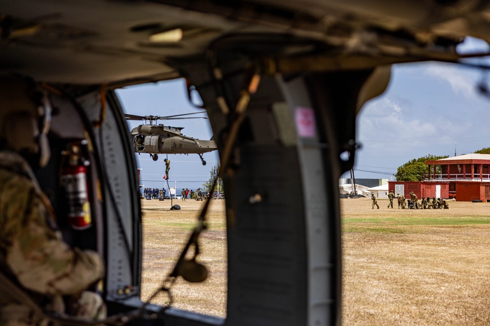 7th Special Operations Group (Airborne) Soldiers lead fast rope training for 8 partner nations