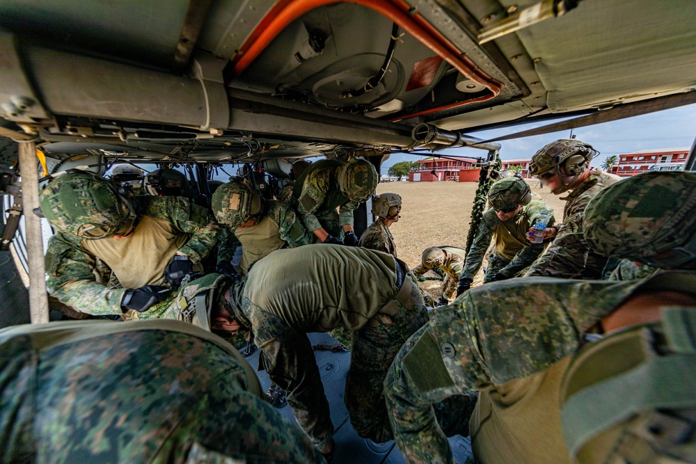 7th Special Operations Group (Airborne) Soldiers lead fast rope training for 8 partner nations