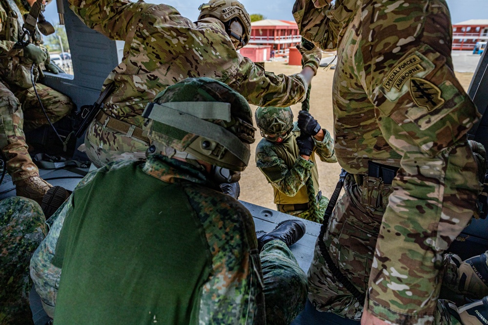 7th Special Operations Group (Airborne) Soldiers lead fast rope training for 8 partner nations