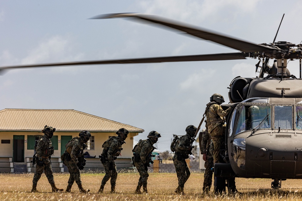 7th Special Operations Group (Airborne) Soldiers lead fast rope training for 8 partner nations