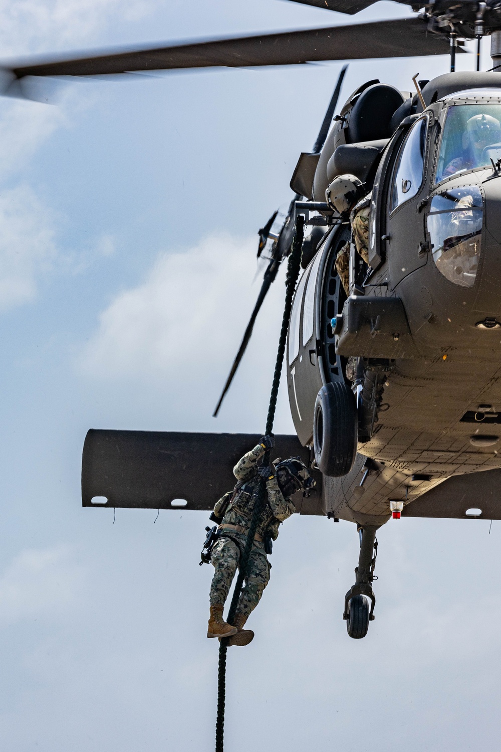 7th Special Operations Group (Airborne) Soldiers lead fast rope training for 8 partner nations