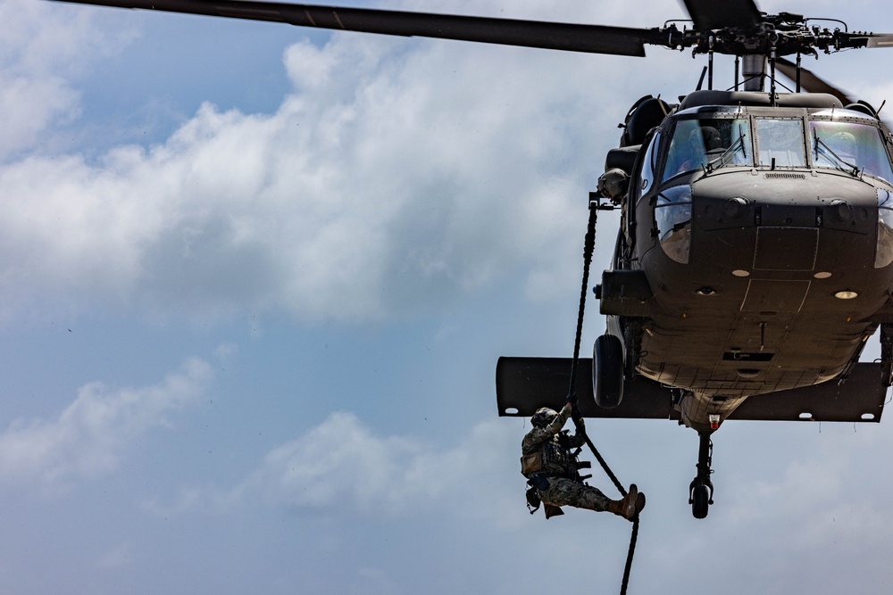 7th Special Operations Group (Airborne) Soldiers lead fast rope training for 8 partner nations